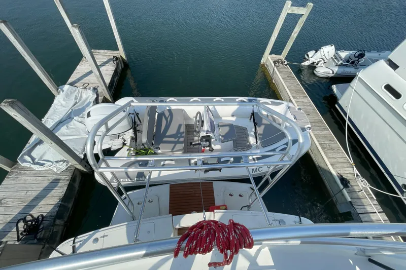  Yacht Photos Pics 2000 Mainship 390 Trawler docked, aerial view of deck and surrounding water.