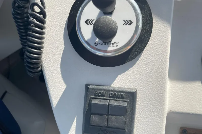  Yacht Photos Pics Control panel of a 2000 Mainship 390 Trawler with bow thruster controls.