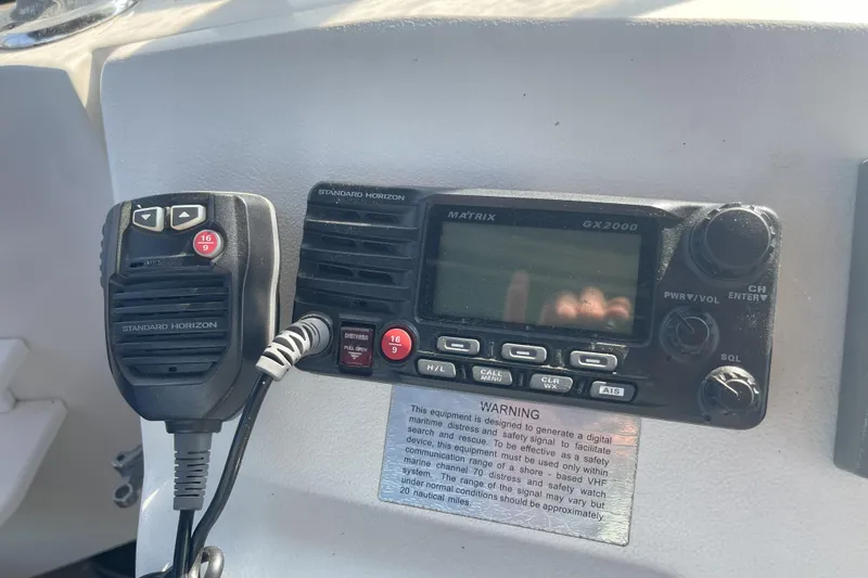  Yacht Photos Pics VHF radio system on 2000 Mainship 390 Trawler boat dashboard.