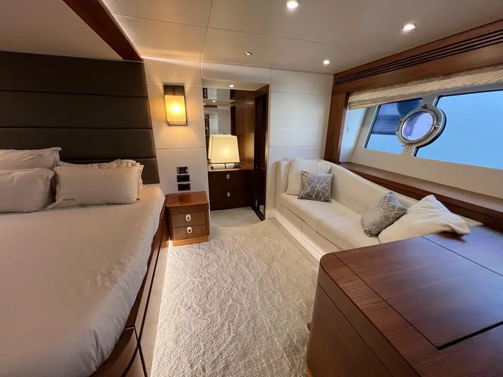 Yacht Photos Pics Luxurious interior of a 2016 Sunseeker 75 Yacht bedroom with elegant furnishings.