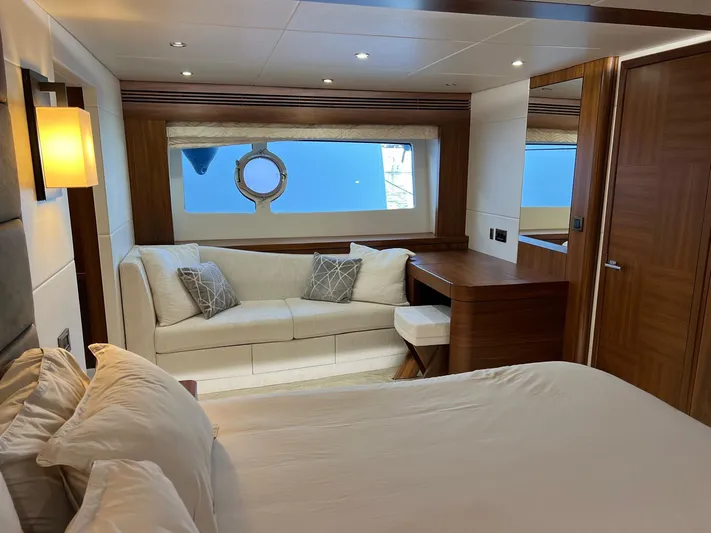  Yacht Photos Pics Luxurious interior of 2016 Sunseeker 75 Yacht with elegant bedroom and seating area.