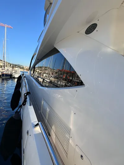  Yacht Photos Pics 2016 Sunseeker 75 Yacht docked at marina, side view with sleek design.