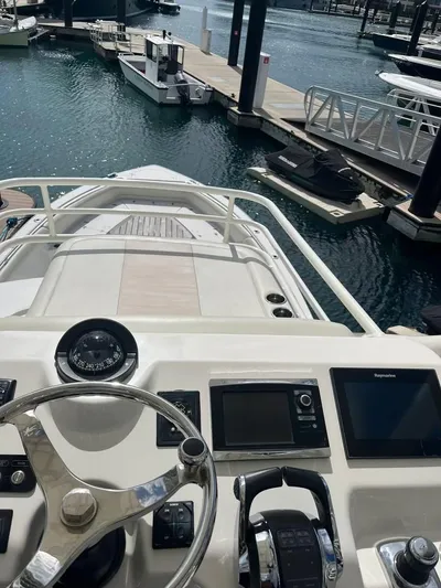 Bite Me Yacht Photos Pics 2017 Boston Whaler 420 Outrage helm with marina view.