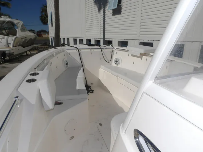  Yacht Photos Pics 2020 Cobia 320 Center Console boat interior with seating and cup holders.