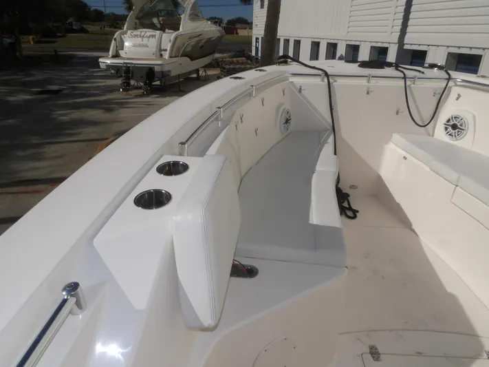  Yacht Photos Pics 2020 Cobia 320 Center Console boat interior with seating and cup holders.