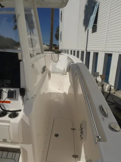  Yacht Photos Pics 2020 Cobia 320 Center Console boat deck with modern features and sleek design.