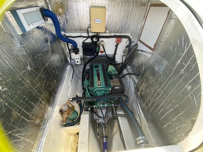 Lah De Dah Yacht Photos Pics Engine compartment of 2007 Manta 44 Power Cat with visible machinery and wiring.