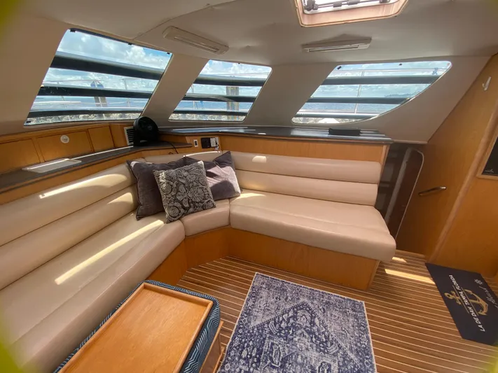Lah De Dah Yacht Photos Pics Interior of 2007 Manta 44 Power Cat with plush seating and nautical decor.