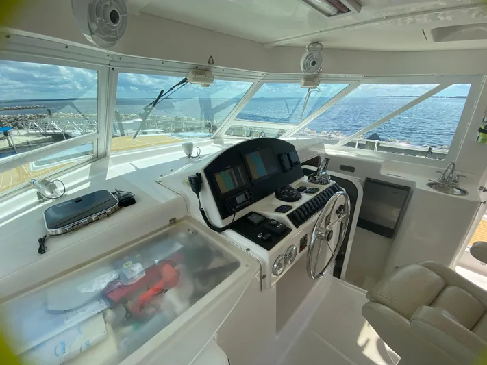 Lah De Dah Yacht Photos Pics Interior helm of 2007 Manta 44 Power Cat with ocean view.