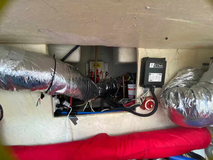 Lah De Dah Yacht Photos Pics Engine compartment of 2007 Manta 44 Power Cat with insulated ducts and wiring.