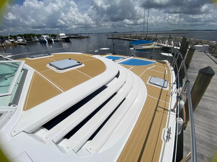 Lah De Dah Yacht Photos Pics 2007 Manta 44 Power Cat docked at marina under cloudy sky.