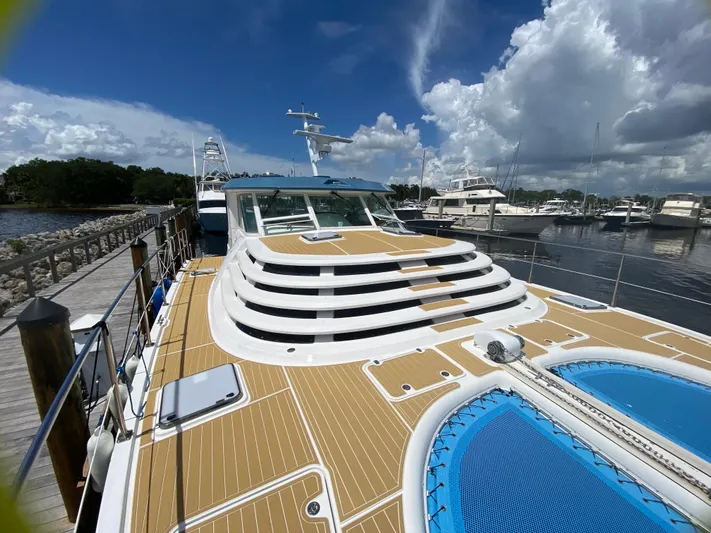 Lah De Dah Yacht Photos Pics 2007 Manta 44 Power Cat docked, featuring spacious deck and modern design.