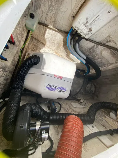 Lah De Dah Yacht Photos Pics Engine compartment of 2007 Manta 44 Power Cat with Next Gen generator.