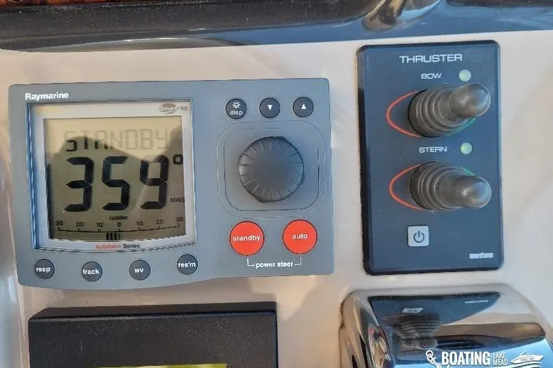  Yacht Photos Pics Control panel of a 2005 Sea Ray 500 Sundancer with Raymarine display and thruster controls.