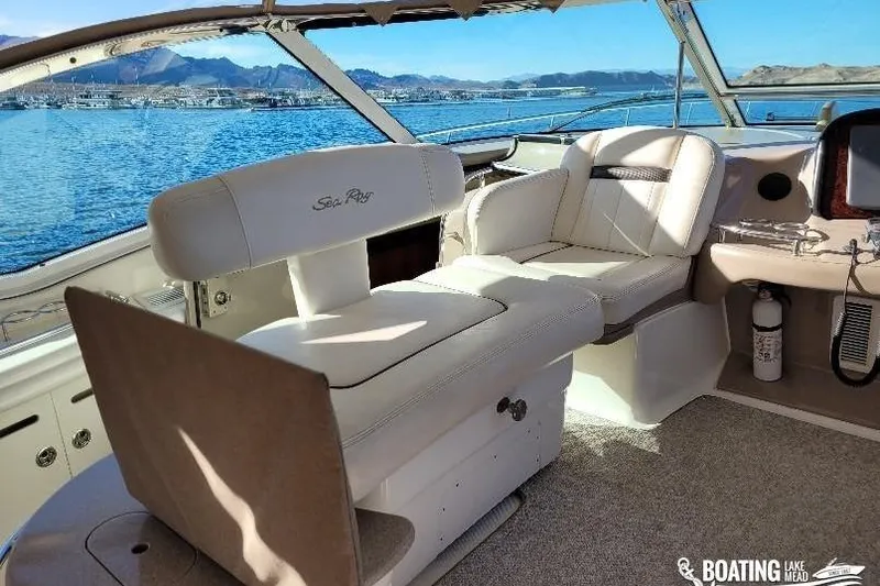 Yacht Photos Pics Interior of 2005 Sea Ray 500 Sundancer yacht with luxurious seating and scenic water view.