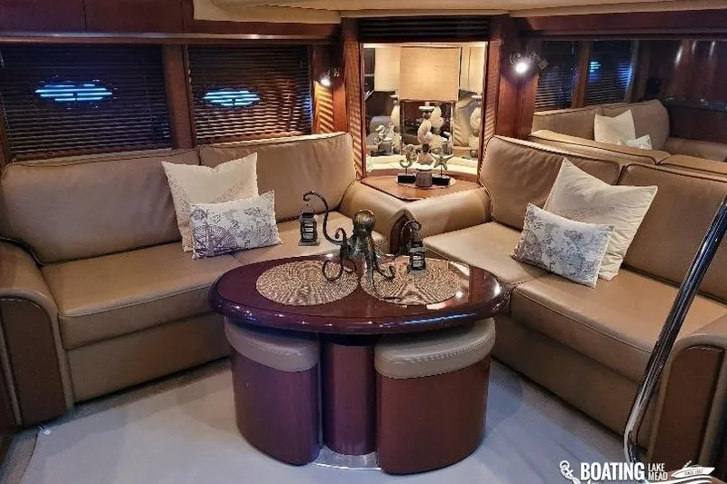  Yacht Photos Pics Luxurious interior of 2005 Sea Ray 500 Sundancer yacht with elegant seating and decor.