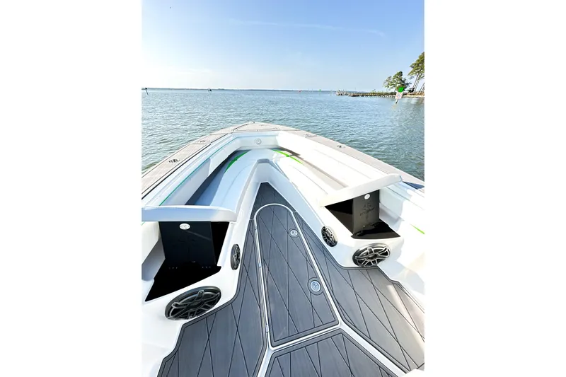  Yacht Photos Pics 2023 Statement 350 Open boat on calm water, featuring sleek deck design.