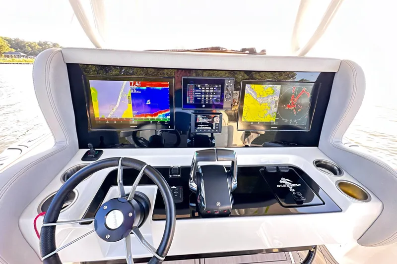 Yacht Photos Pics 2023 Statement 350 Open boat dashboard with advanced navigation displays and controls.