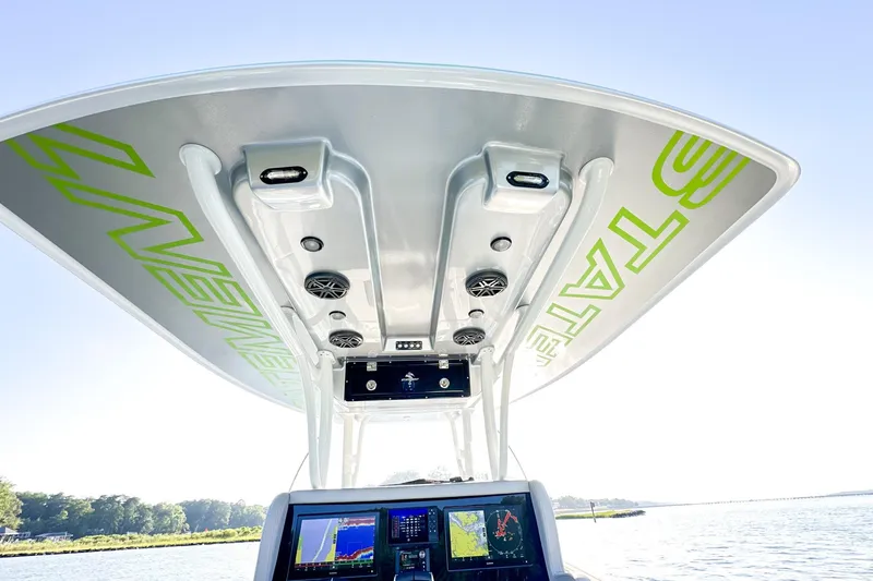  Yacht Photos Pics 2023 Statement 350 Open boat console with advanced navigation displays and overhead speakers.