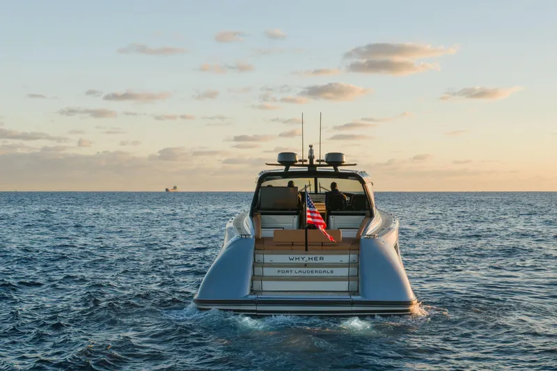 Why Her Yacht Photos Pics 2024 Wajer 55 HT yacht cruising at sunset with American flag.