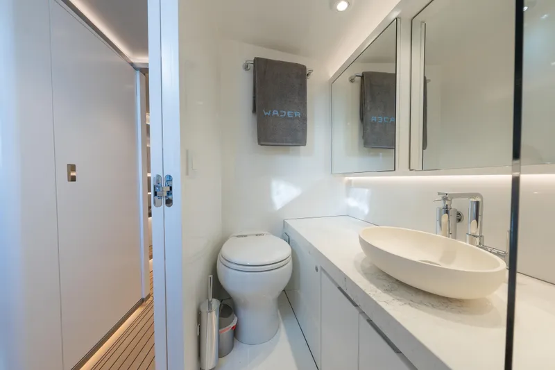 Why Her Yacht Photos Pics Luxurious bathroom in 2024 Wajer 55 HT yacht, featuring modern fixtures and elegant design.