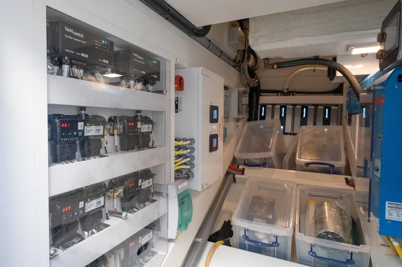 Why Her Yacht Photos Pics Electrical control room of 2024 Wajer 55 HT yacht, featuring organized wiring and storage boxes.