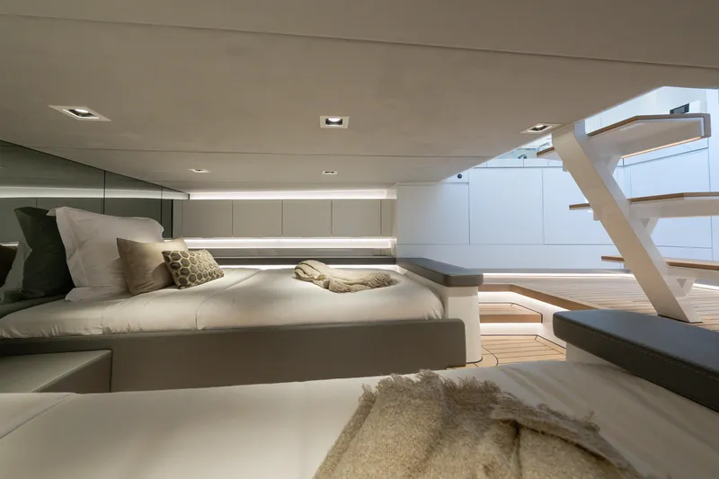 Why Her Yacht Photos Pics Luxurious interior of 2024 Wajer 55 HT yacht with modern bedding and elegant design.