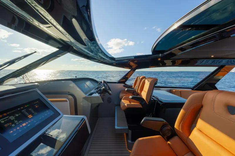 Why Her Yacht Photos Pics Luxurious 2024 Wajer 55 HT yacht interior with leather seats and ocean view.
