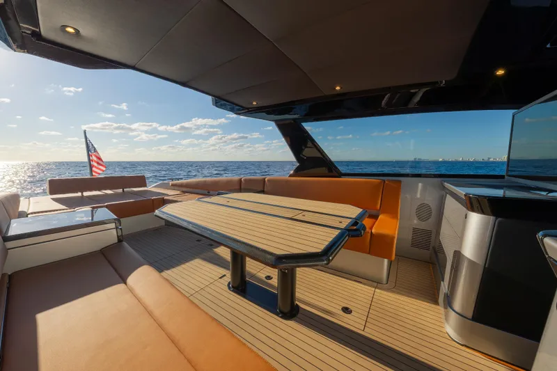 Why Her Yacht Photos Pics Luxurious 2024 Wajer 55 HT yacht interior with ocean view and elegant seating.
