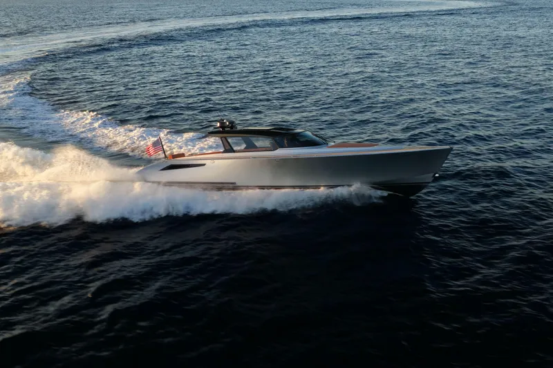 Why Her Yacht Photos Pics 2024 Wajer 55 HT yacht cruising on open water at sunset.