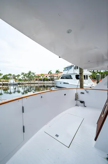 Motivated Seller Yacht Photos Pics 1986 Tollycraft Pilothouse yacht docked at a marina.