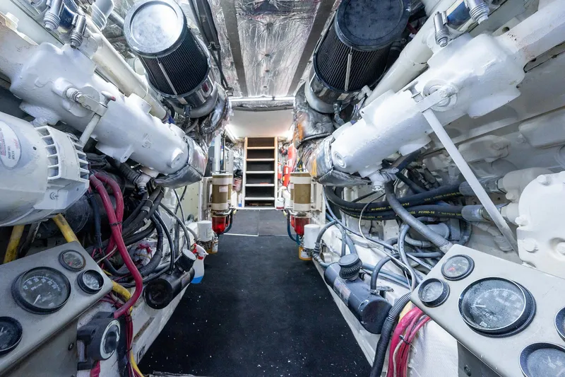 Motivated Seller Yacht Photos Pics 1986 Tollycraft Pilothouse engine room with dual engines and control gauges.