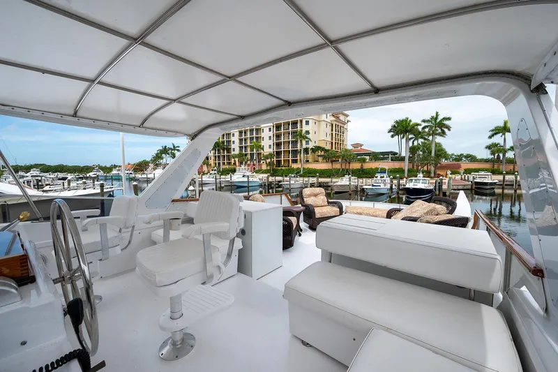 Motivated Seller Yacht Photos Pics 1986 Tollycraft Pilothouse yacht interior with marina view.