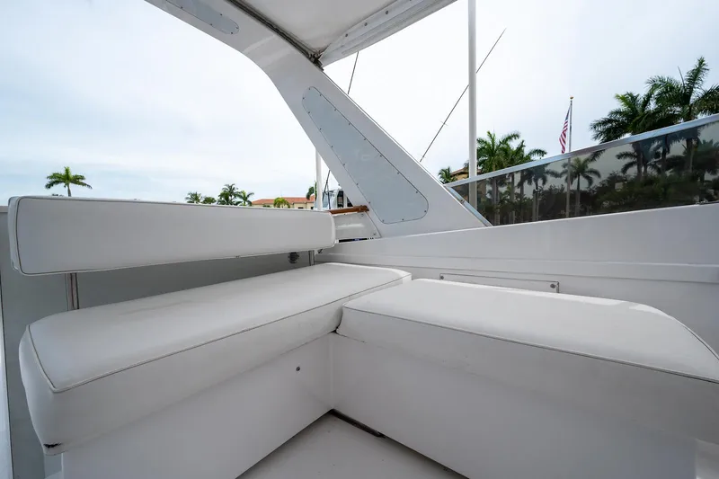 Motivated Seller Yacht Photos Pics 1986 Tollycraft Pilothouse boat with white cushioned seating area.