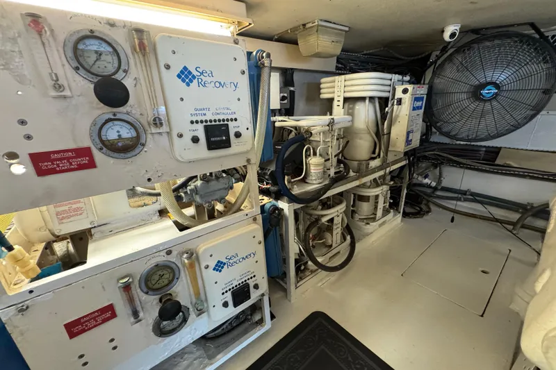  Yacht Photos Pics Engine room of a 1995 Viking 58 Convertible yacht with Sea Recovery system.