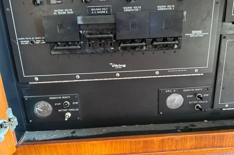  Yacht Photos Pics Electrical panel of a 1995 Viking 58 Convertible boat with generator controls.
