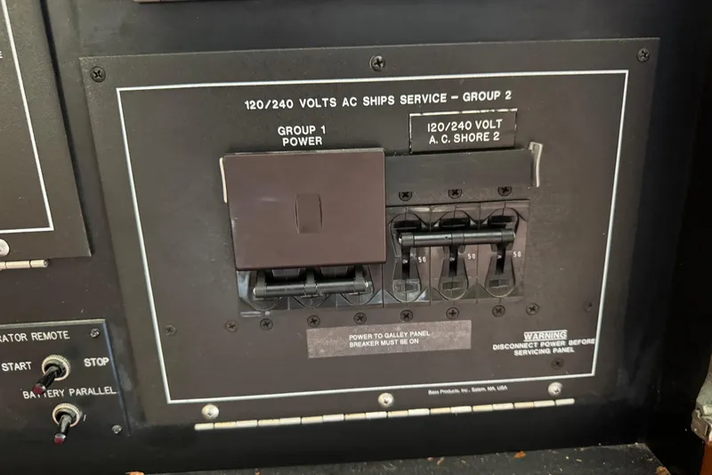  Yacht Photos Pics Electrical panel on a 1995 Viking 58 Convertible boat, showing switches and voltage details.