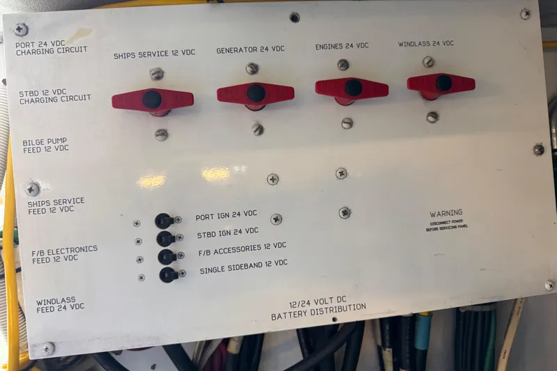  Yacht Photos Pics Battery distribution panel on a 1995 Viking 58 Convertible boat, showing various circuit controls.
