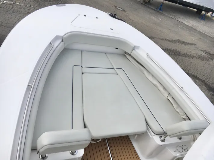  Yacht Photos Pics 2020 Southport 33 FE boat with spacious white seating area.