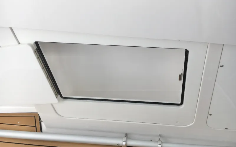  Yacht Photos Pics 2020 Southport 33 FE boat interior hatch detail, showcasing sleek design and functionality.