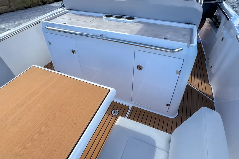  Yacht Photos Pics Luxury STERK 31 boat interior with sleek design and wooden flooring, 2025 model.
