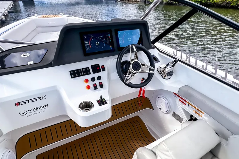  Yacht Photos Pics Modern STERK 31 boat cockpit with advanced controls and digital displays, 2025 model.