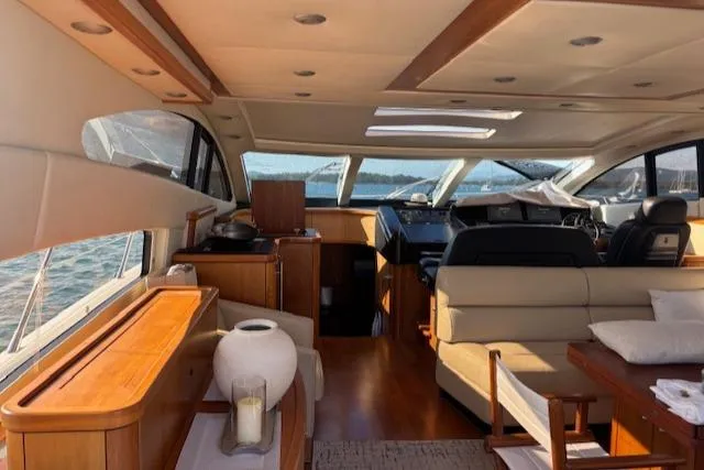 Joško Marić Yacht Photos Pics Luxurious interior of 2008 Sunseeker Predator 72 yacht with elegant wood and leather finishes.