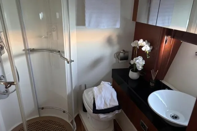 Joško Marić Yacht Photos Pics Luxurious bathroom in 2008 Sunseeker Predator 72 yacht with shower and elegant decor.