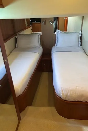 Joško Marić Yacht Photos Pics Twin cabin in 2008 Sunseeker Predator 72 yacht with wooden accents.