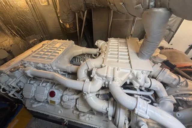 Joško Marić Yacht Photos Pics Engine room of 2008 Sunseeker Predator 72 yacht, showcasing powerful machinery and components.