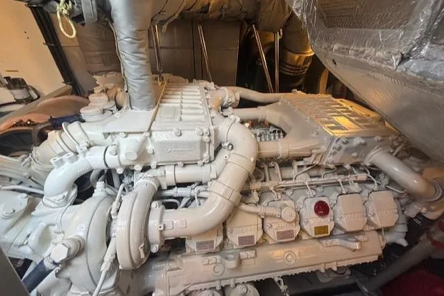 Joško Marić Yacht Photos Pics Engine room of a 2008 Sunseeker Predator 72 yacht, showcasing complex machinery.