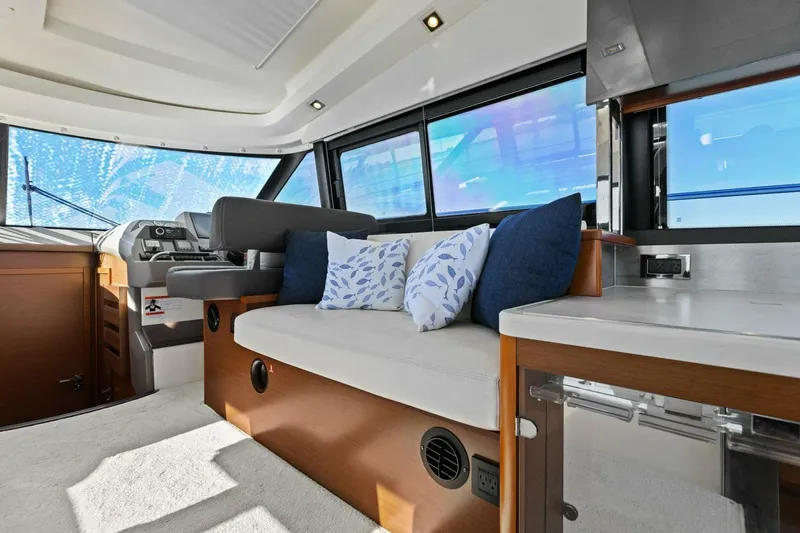 Slainte Yacht Photos Pics Luxurious interior of 2014 Prestige 450 S yacht with plush seating and modern design.