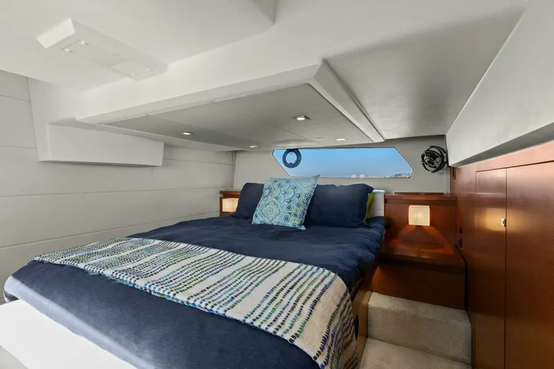 Slainte Yacht Photos Pics Luxurious cabin interior of 2014 Prestige 450 S yacht with cozy bedding.