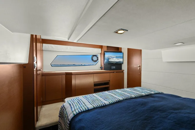 Slainte Yacht Photos Pics Luxurious cabin interior of 2014 Prestige 450 S yacht with modern amenities.